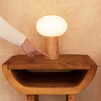 Max cordless lamp side view showing rubberwood and matte glass shade