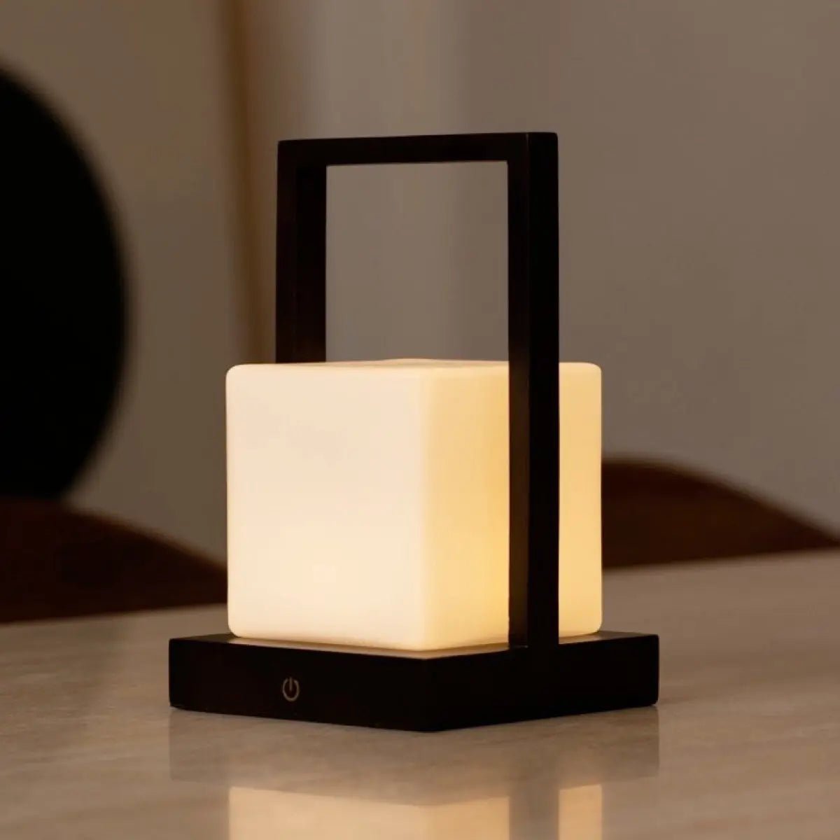 Noah dark lamp on bedside table