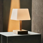 Tommy wood lamp on outdoor terrace in ambient light mode