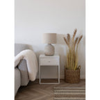 Solea ceramic lamp side view showing smooth rounded base