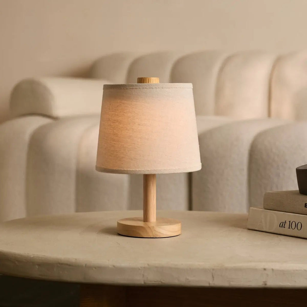 Rover wooden lamp on bedside table in bedroom