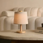 Rover wooden lamp on bedside table in bedroom