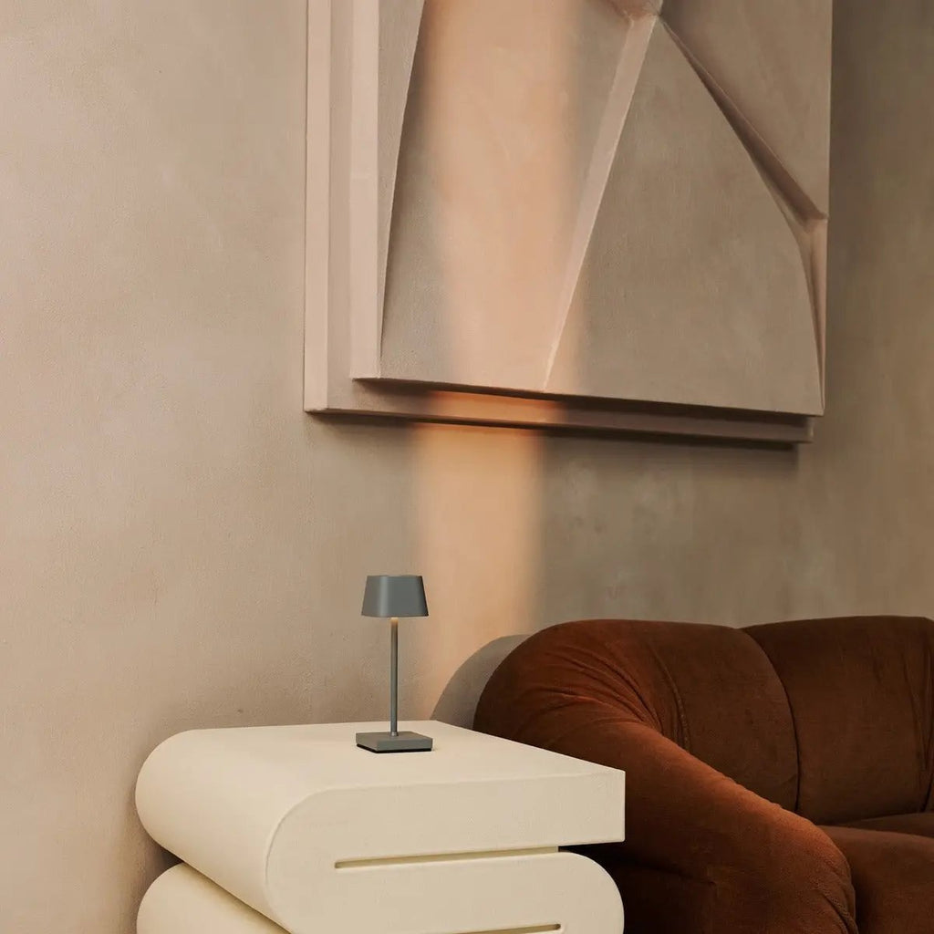 Sarphati rechargeable lamp on dining table with warm candlelight mode
