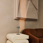 Sarphati rechargeable lamp on dining table with warm candlelight mode
