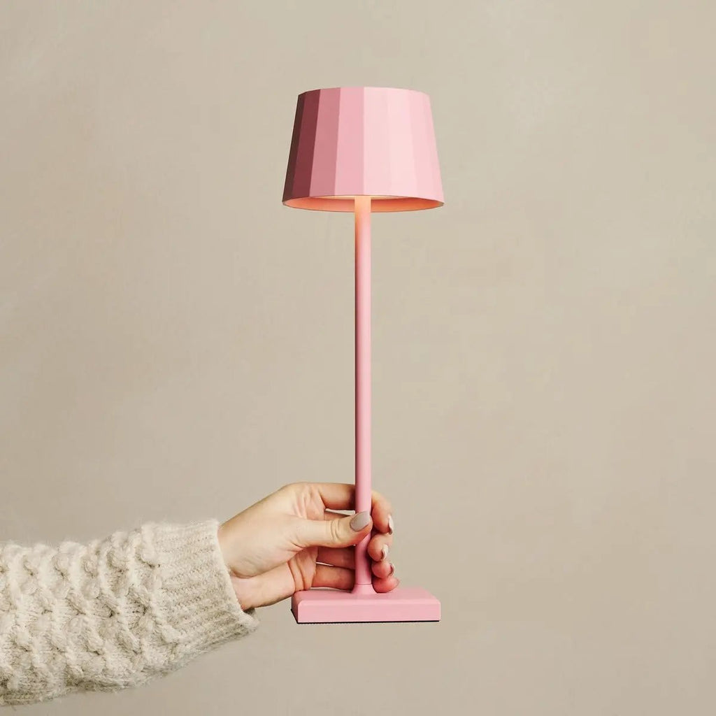 Wouter cordless lamp detail of flamingo pink metal finish
