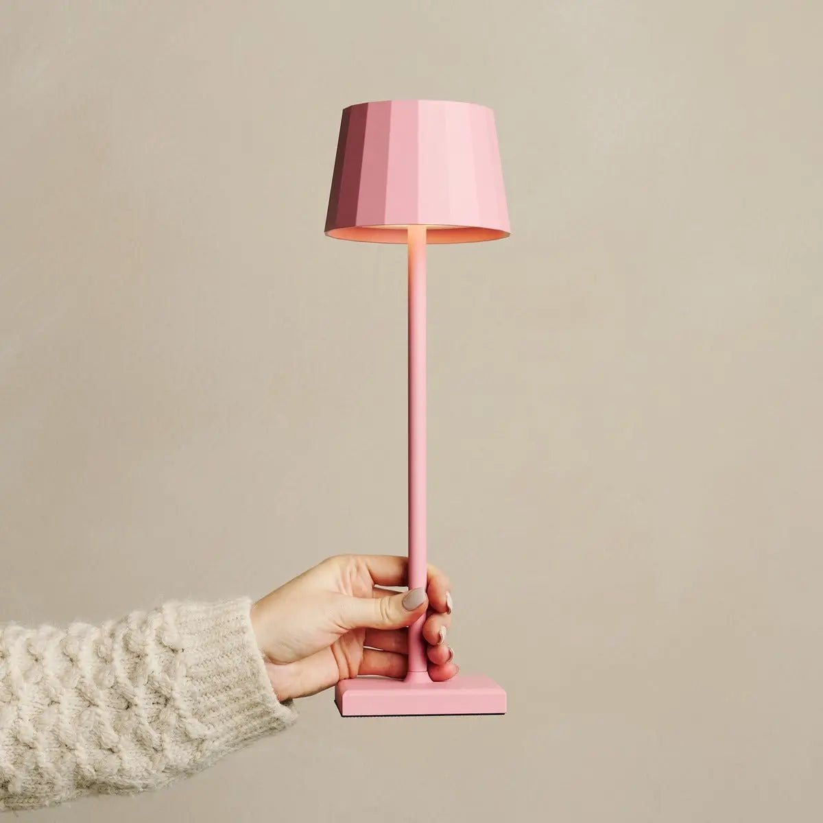Ines cordless lamp detail of flamingo pink metal finish