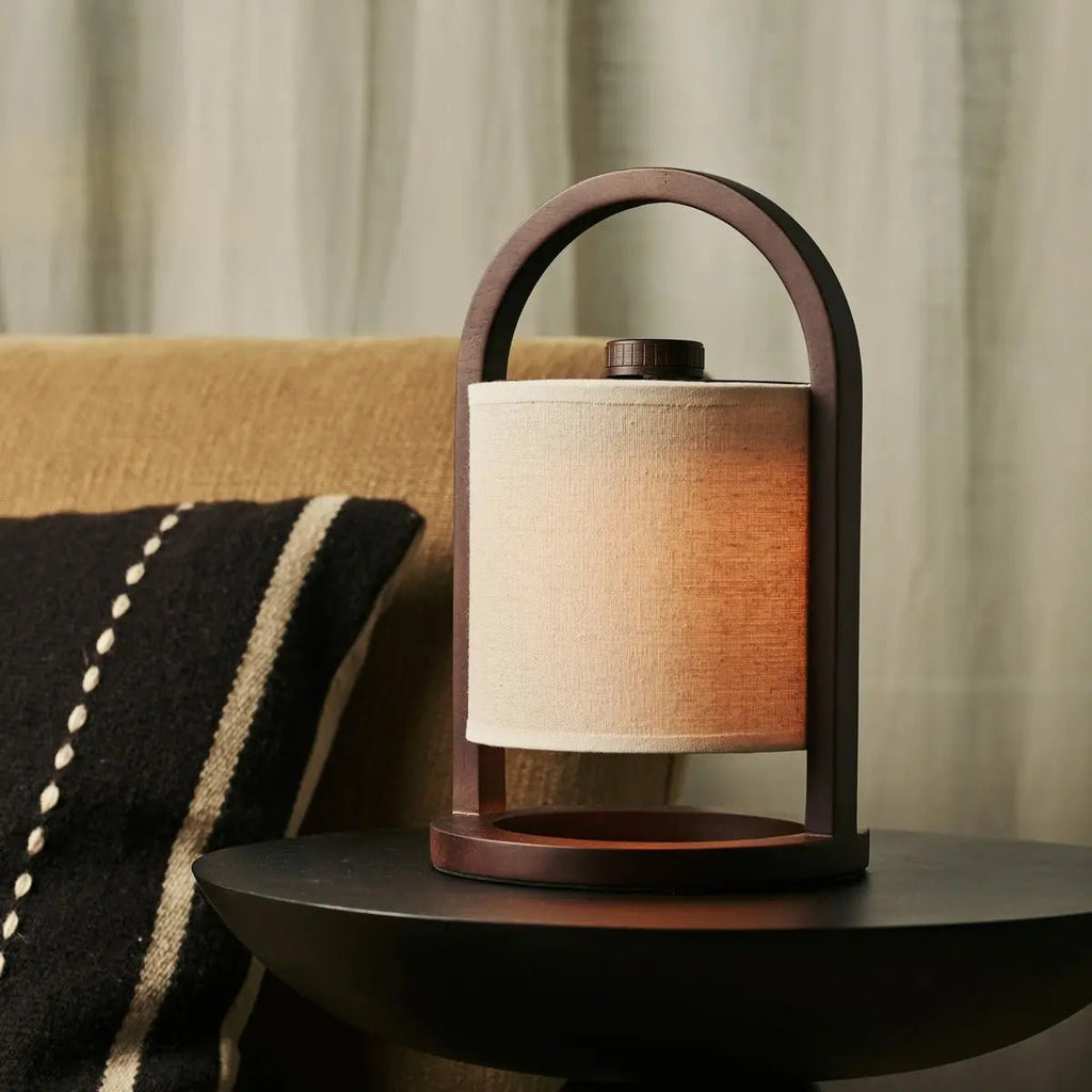 River dark wood cordless lamp on outdoor covered terrace