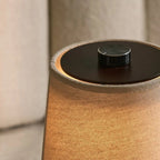 Rover cordless lamp detail of linen shade and dark wood