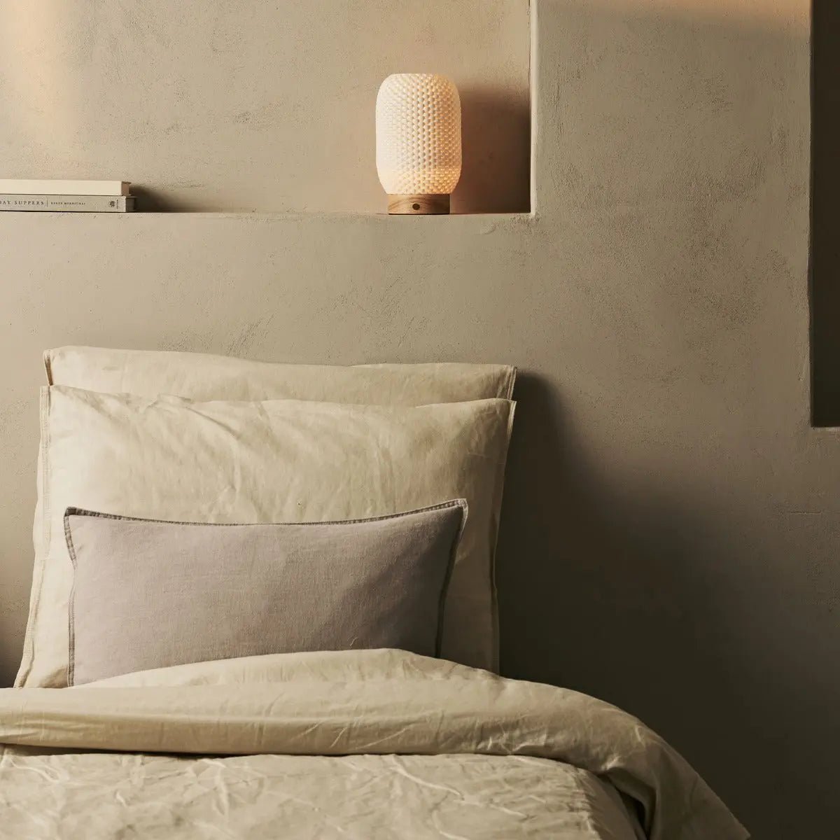 Aurora cordless lamp side view showing wood base and porcelain shade