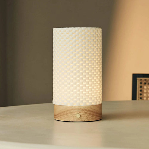 Luna cordless lamp side view showing rubberwood base and porcelain shade