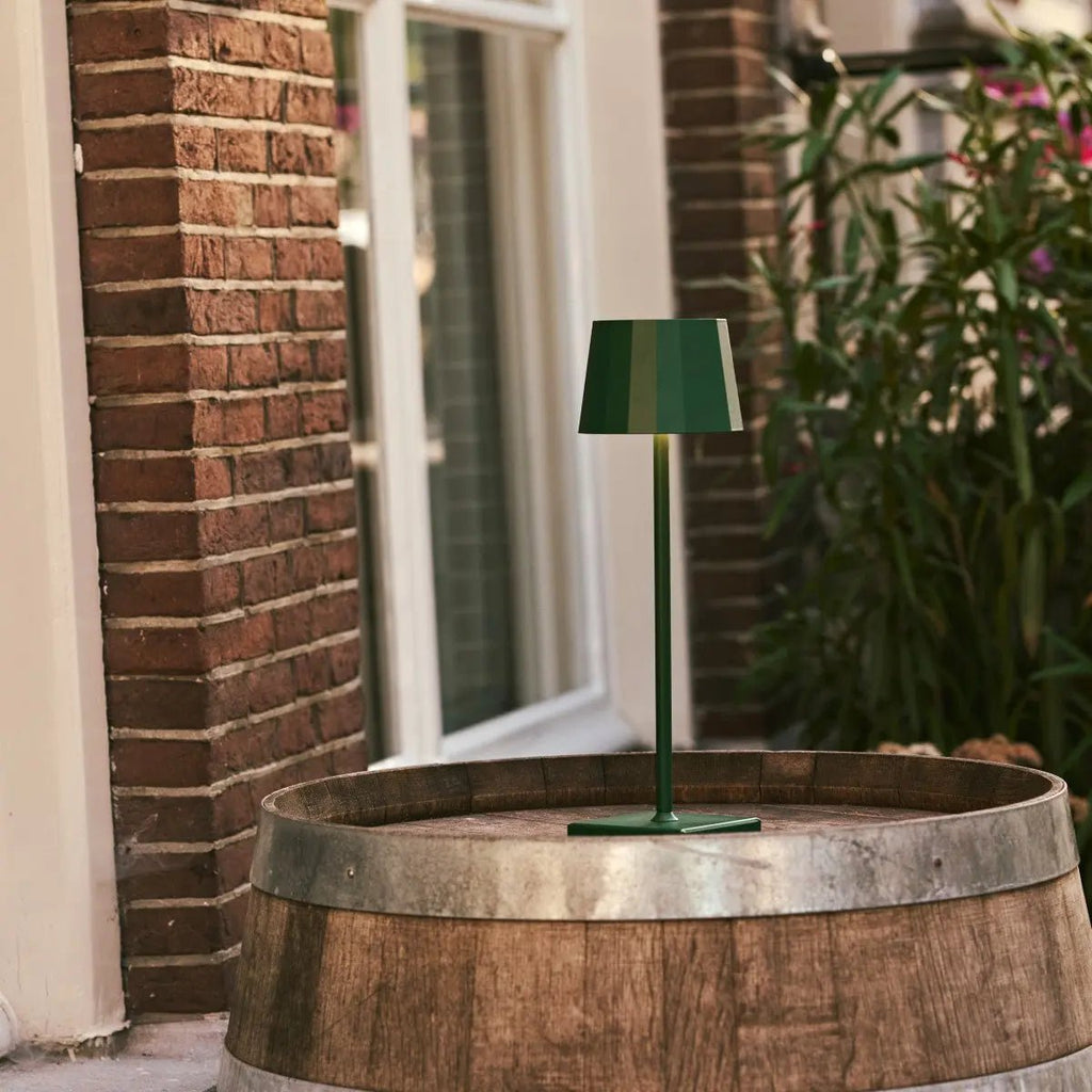 William rechargeable lamp warm ambient glow on bedside table