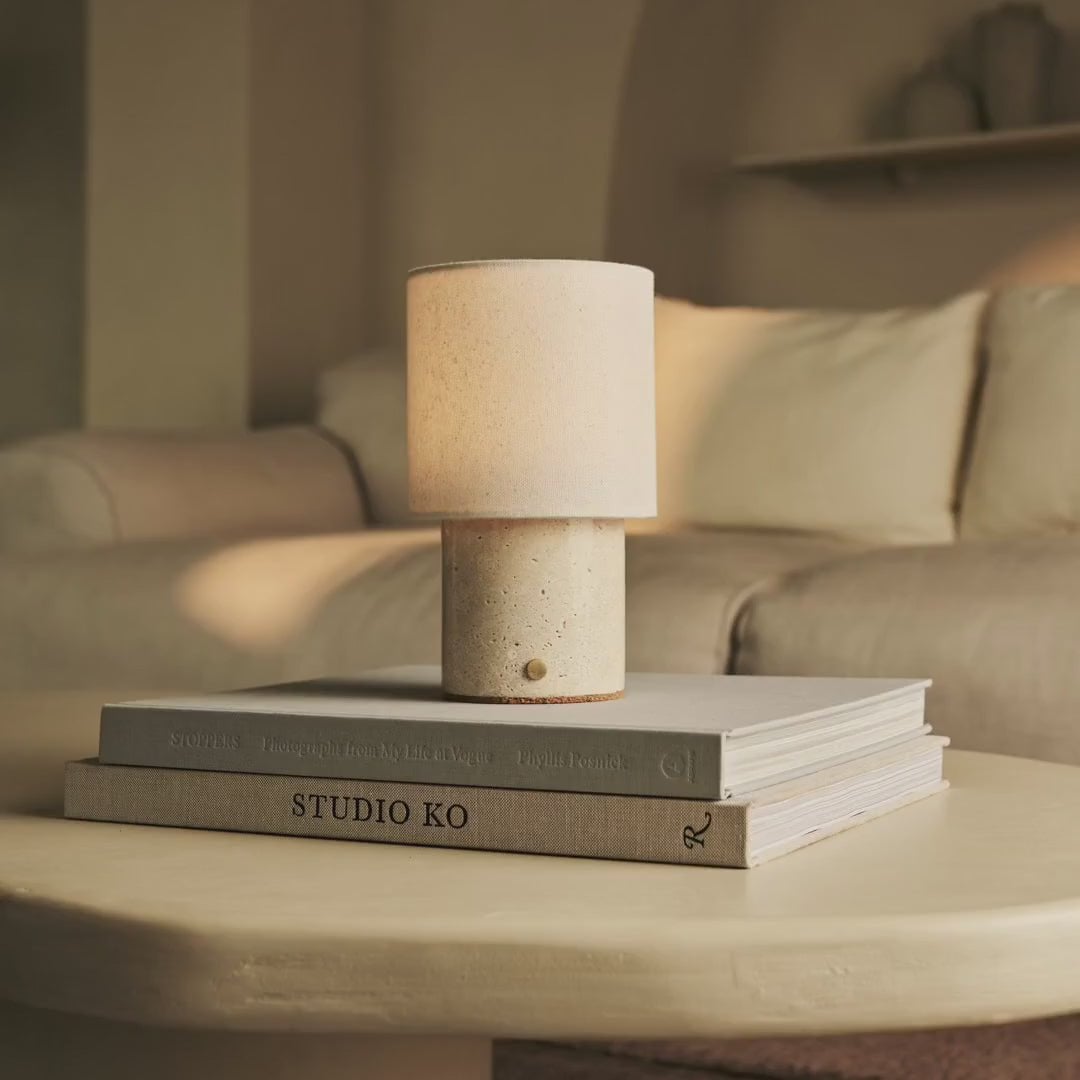 Dou rechargeable lamp close-up of Verde Alpi marble veining