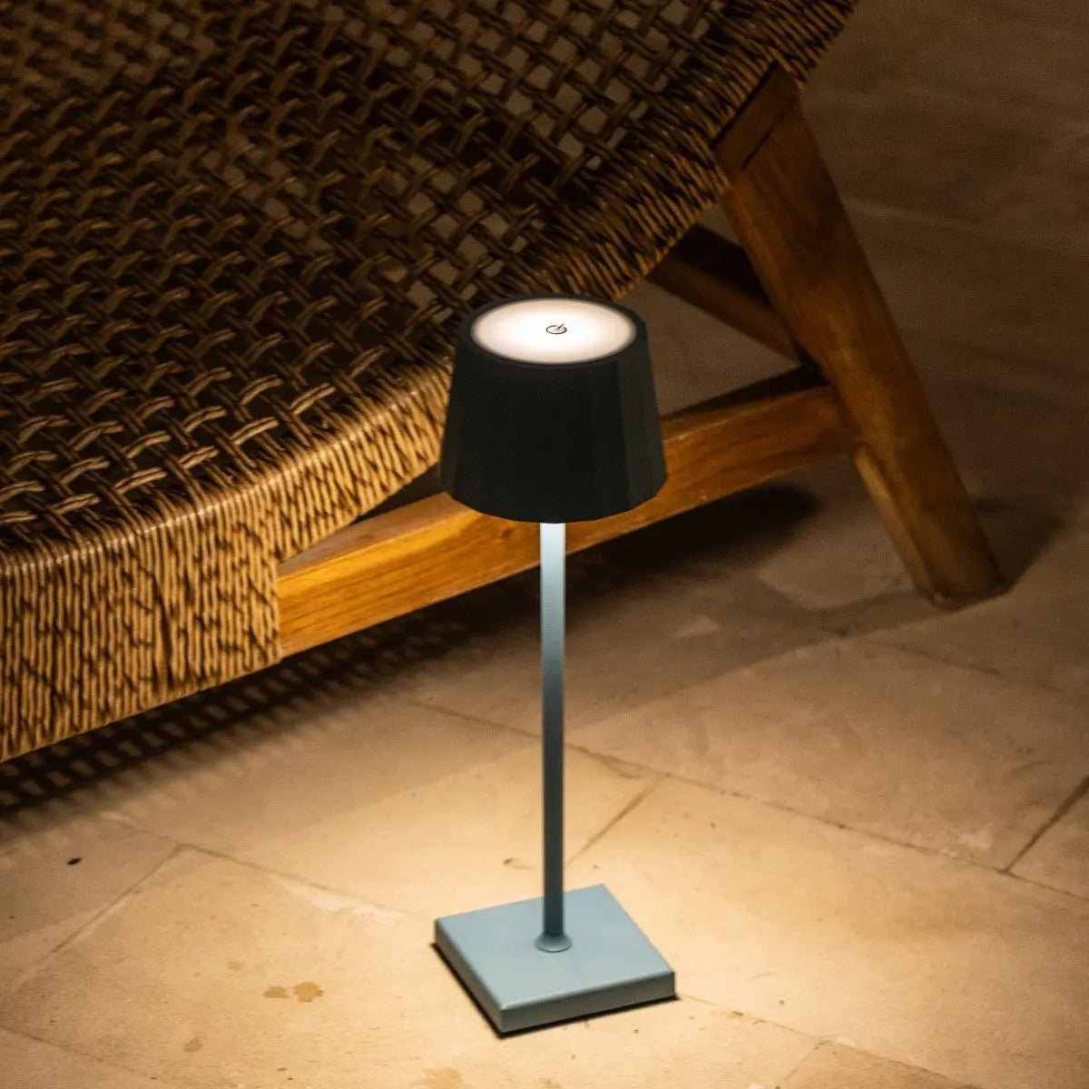 William metal lamp on outdoor covered terrace