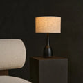 Jacob black wood corded table lamp with beige linen-mix shade