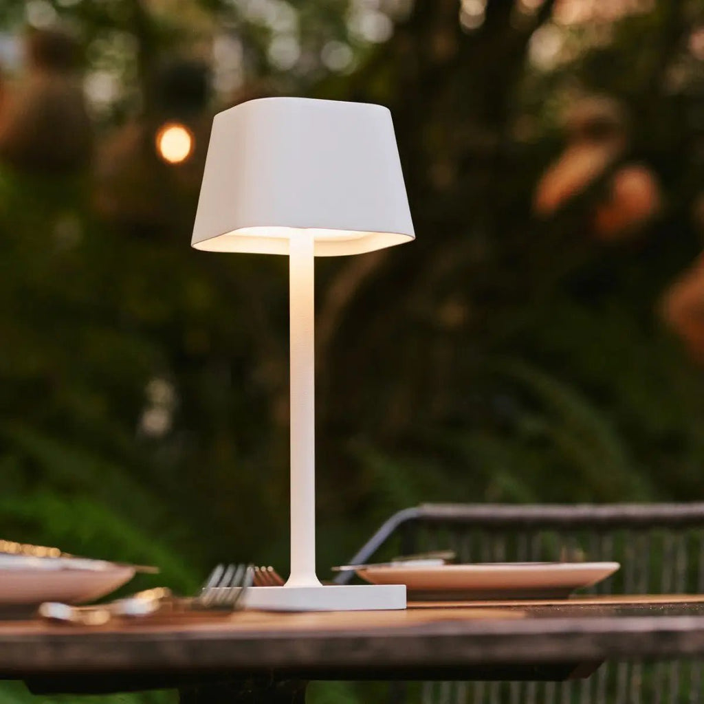 Ava metal lamp side view showing cylindrical white form