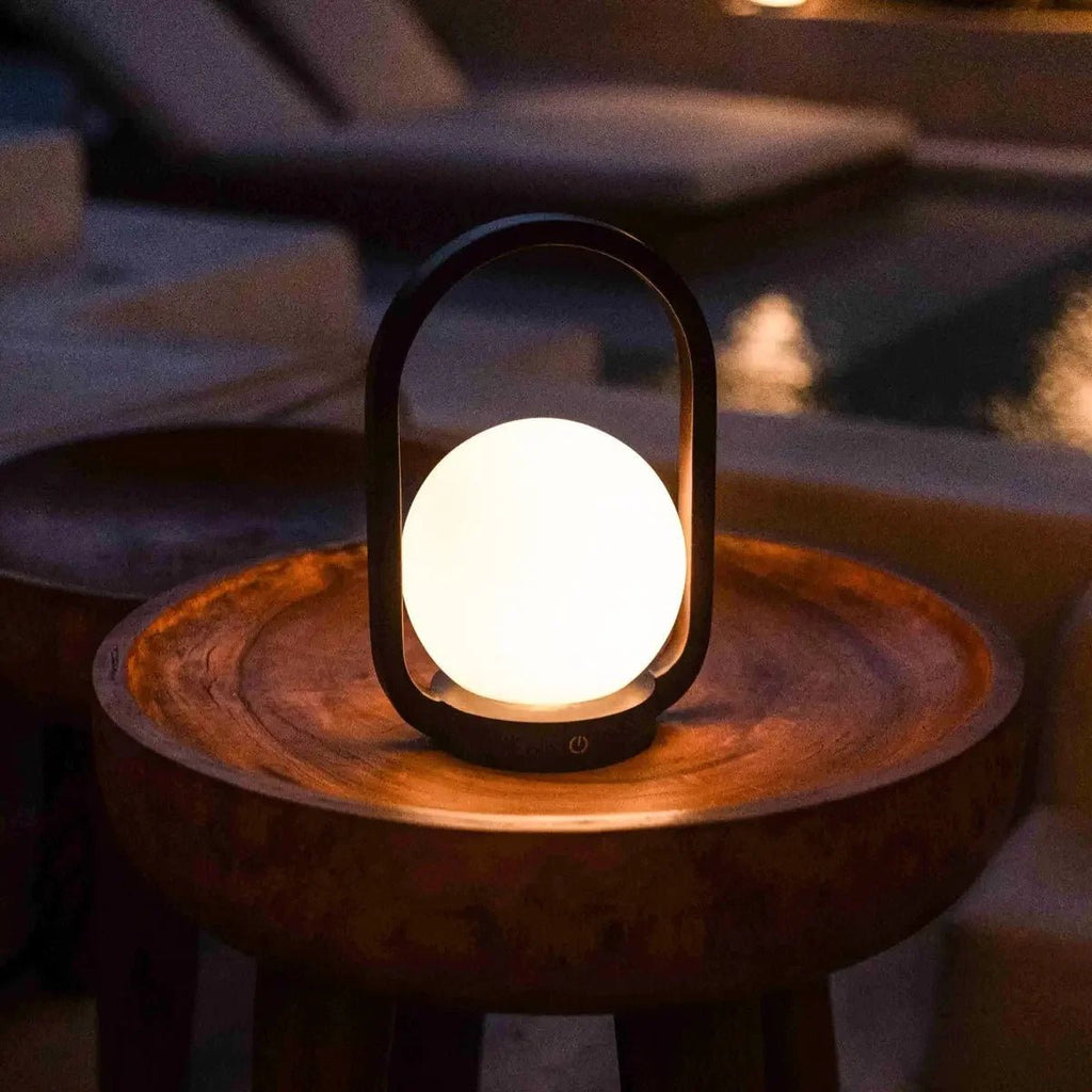 Skye dark wood lamp on outdoor covered terrace