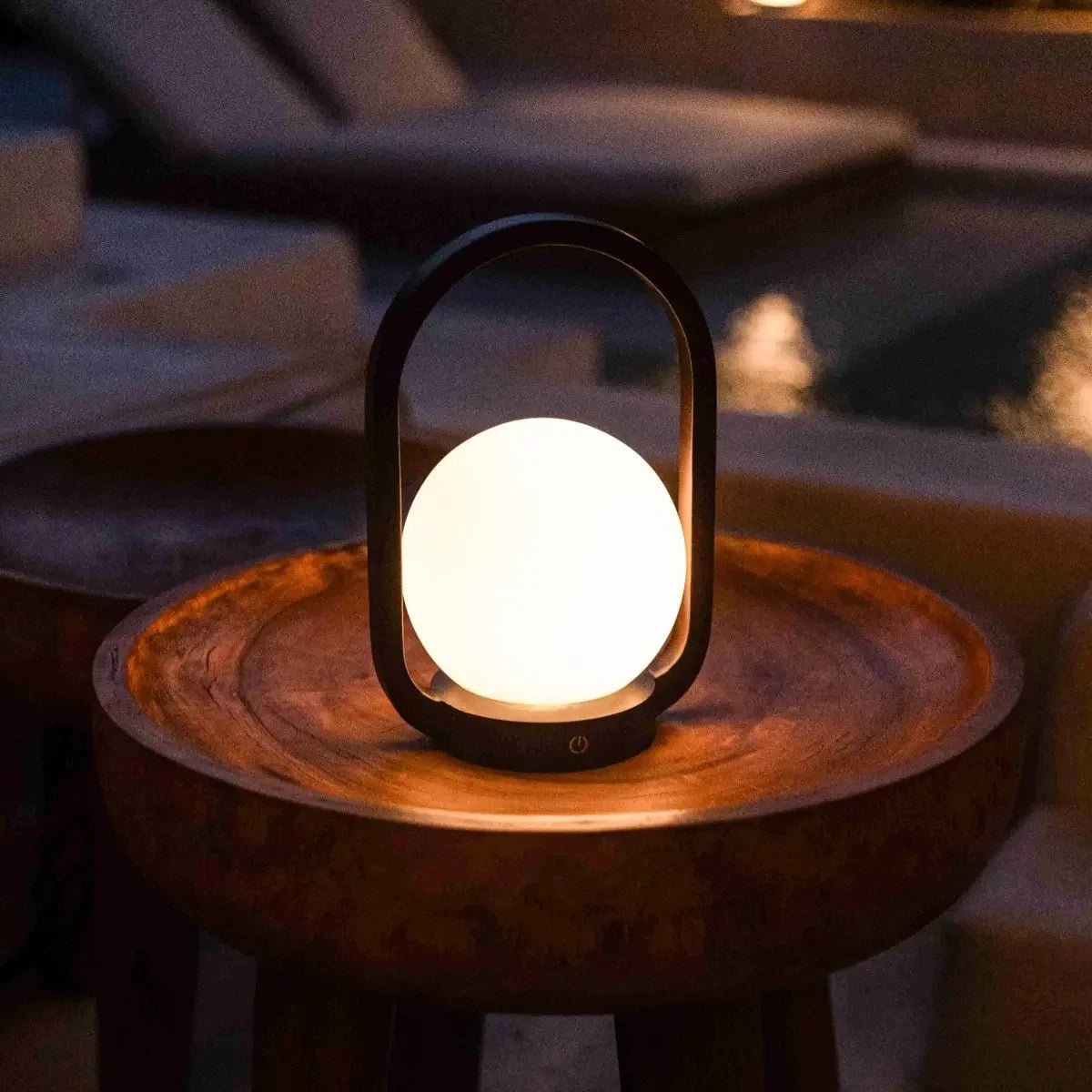 Skye dark wood lamp on outdoor covered terrace