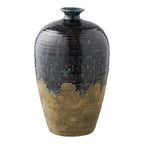 Midnight Wave vase with large floral arrangement in living room