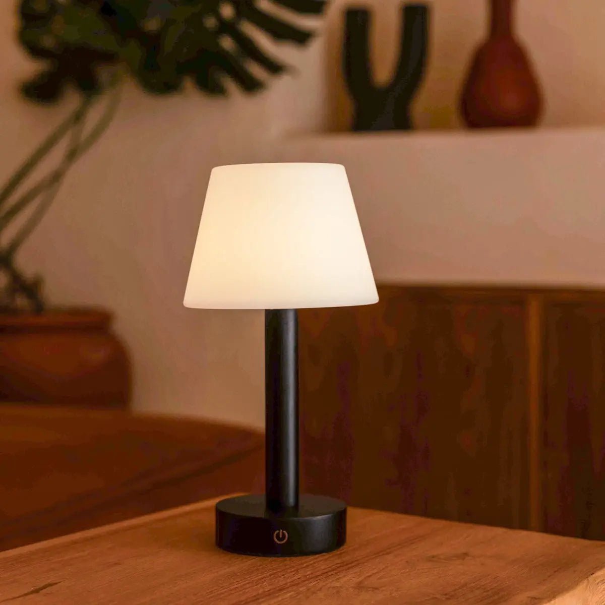 Zoe black wood lamp on bedside table ambient mode