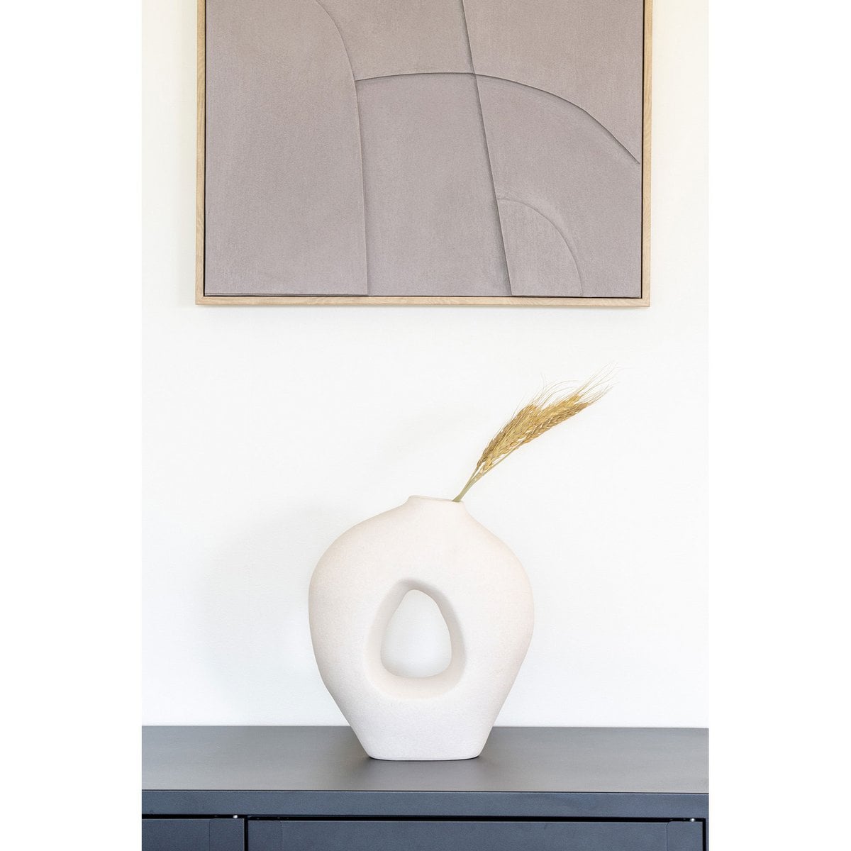 Lumira white ceramic sculptural vase with central cutout