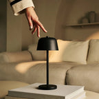 Anton rechargeable lamp warm ambient glow on bedside table