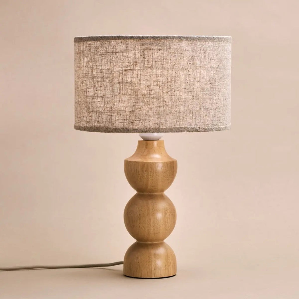 Oliver table lamp warm glow in bedroom bedside setting