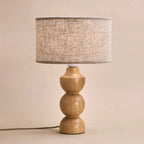 Oliver table lamp warm glow in bedroom bedside setting
