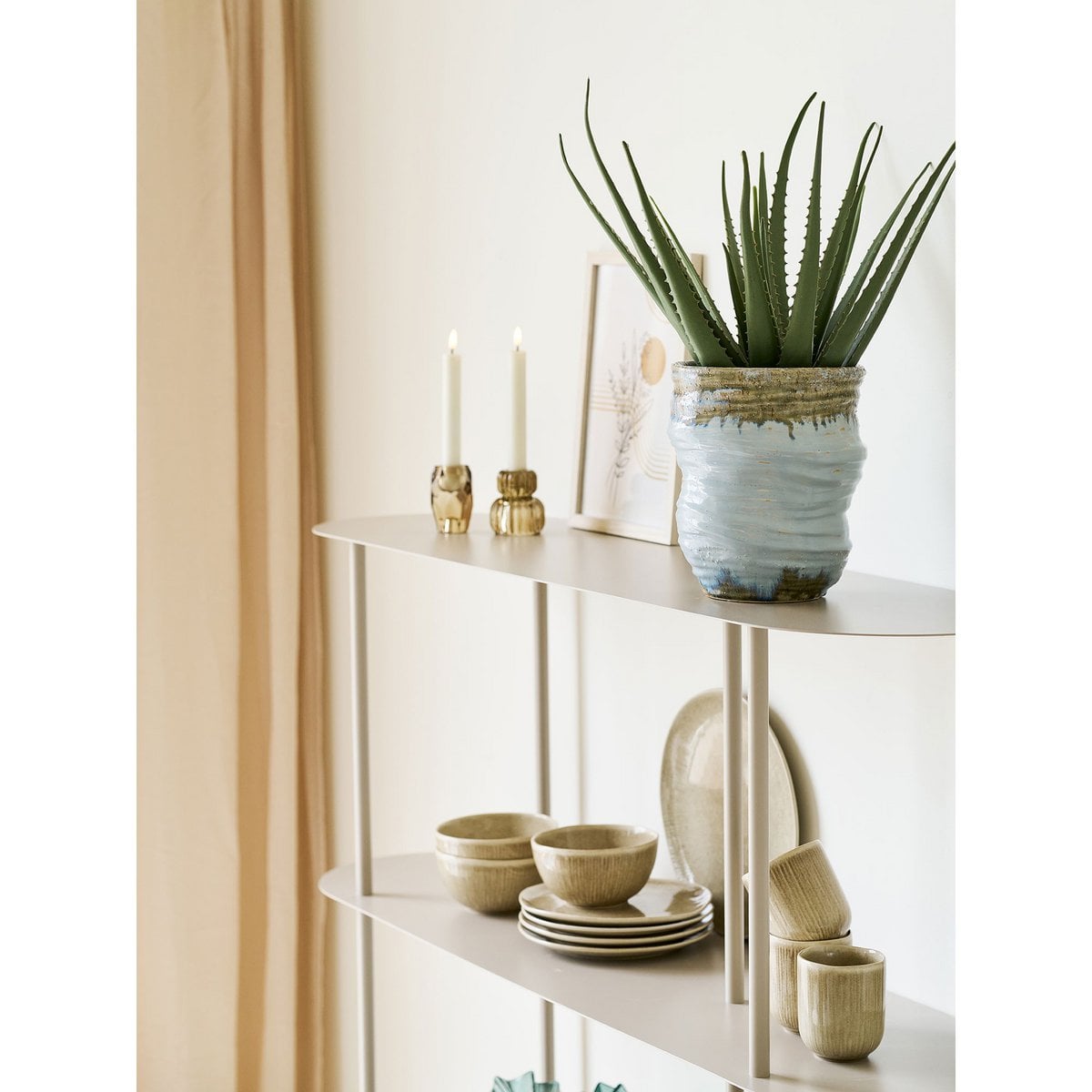 Azure Bloom vase side view showing smooth light blue form