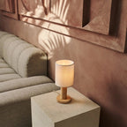 Boris fabric shade lamp in bedroom bedside setting