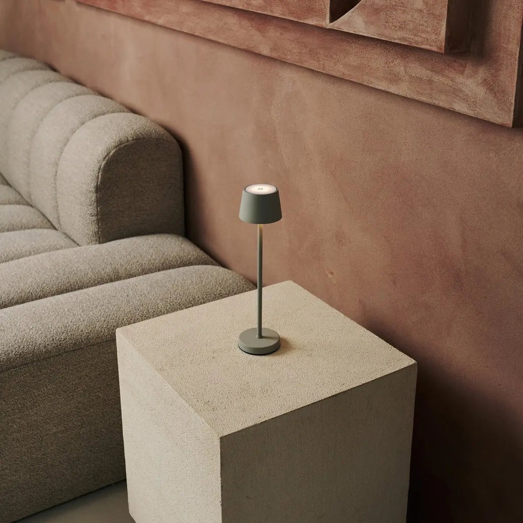 Vondel shadow grey rechargeable lamp on bedside table
