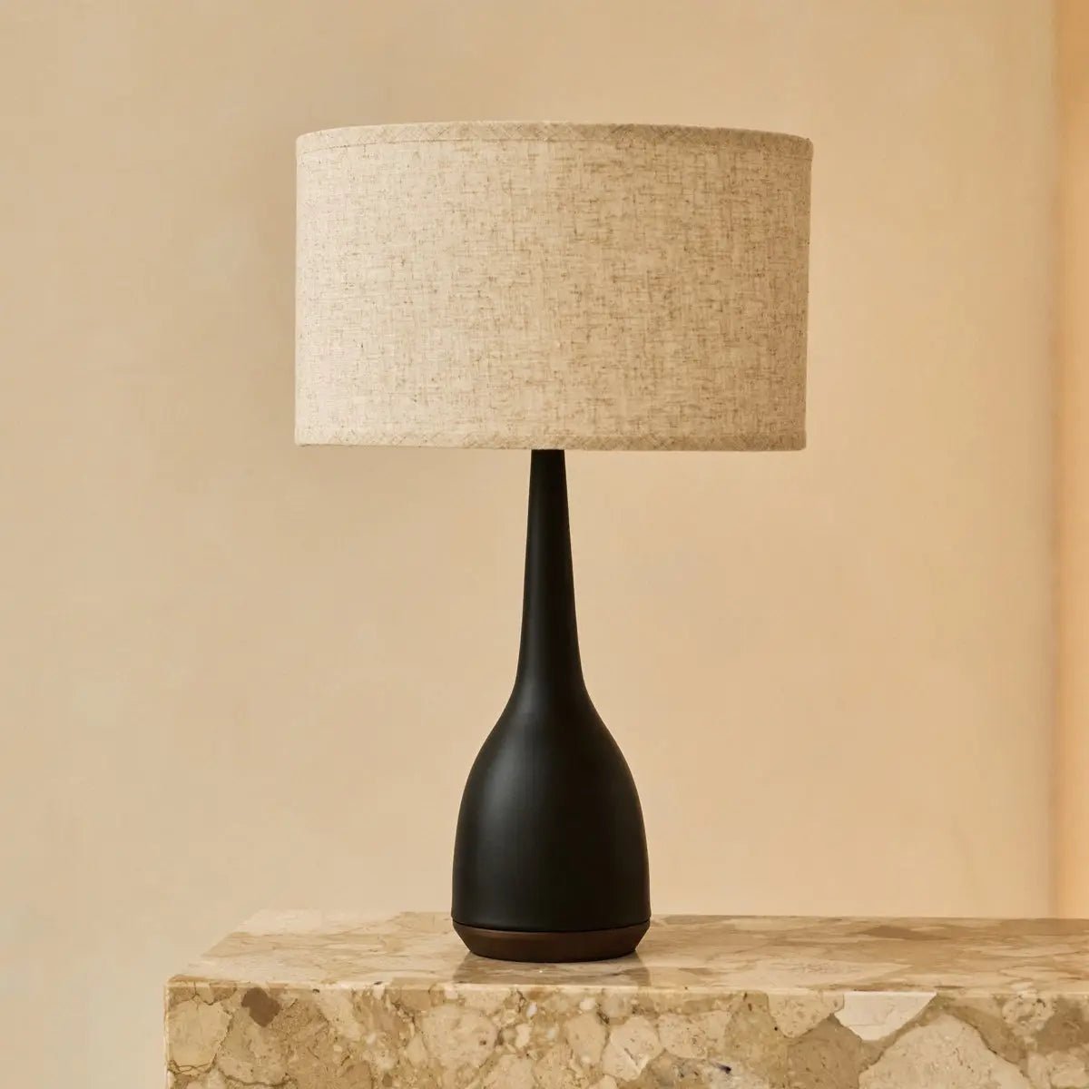 Navo black wood lamp close-up of beige linen shade
