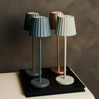 Maya cordless lamp docked on dwelly charging station