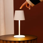 James metal lamp side view showing cylindrical white form