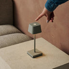 Sarphati rechargeable lamp in hotel lobby setting