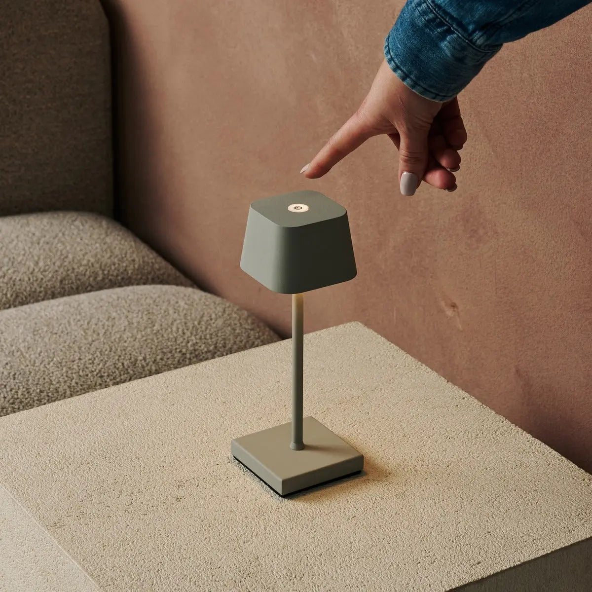 Sarphati rechargeable lamp in hotel lobby setting