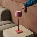 Wouter rechargeable lamp warm ambient glow on bedside table