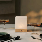 Yce Mini cordless lamp detail of glass shade and wood base