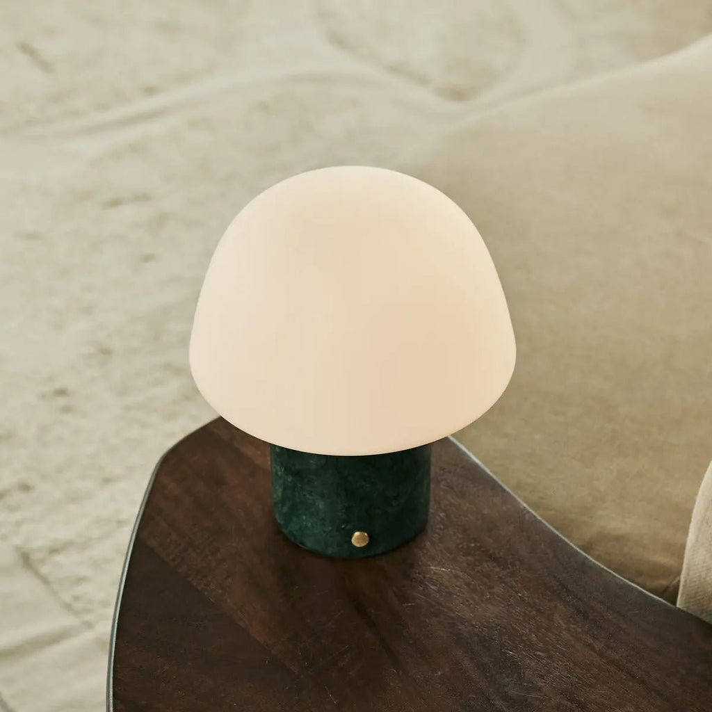 Maes rechargeable lamp in living room console