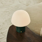 Maes rechargeable lamp in living room console