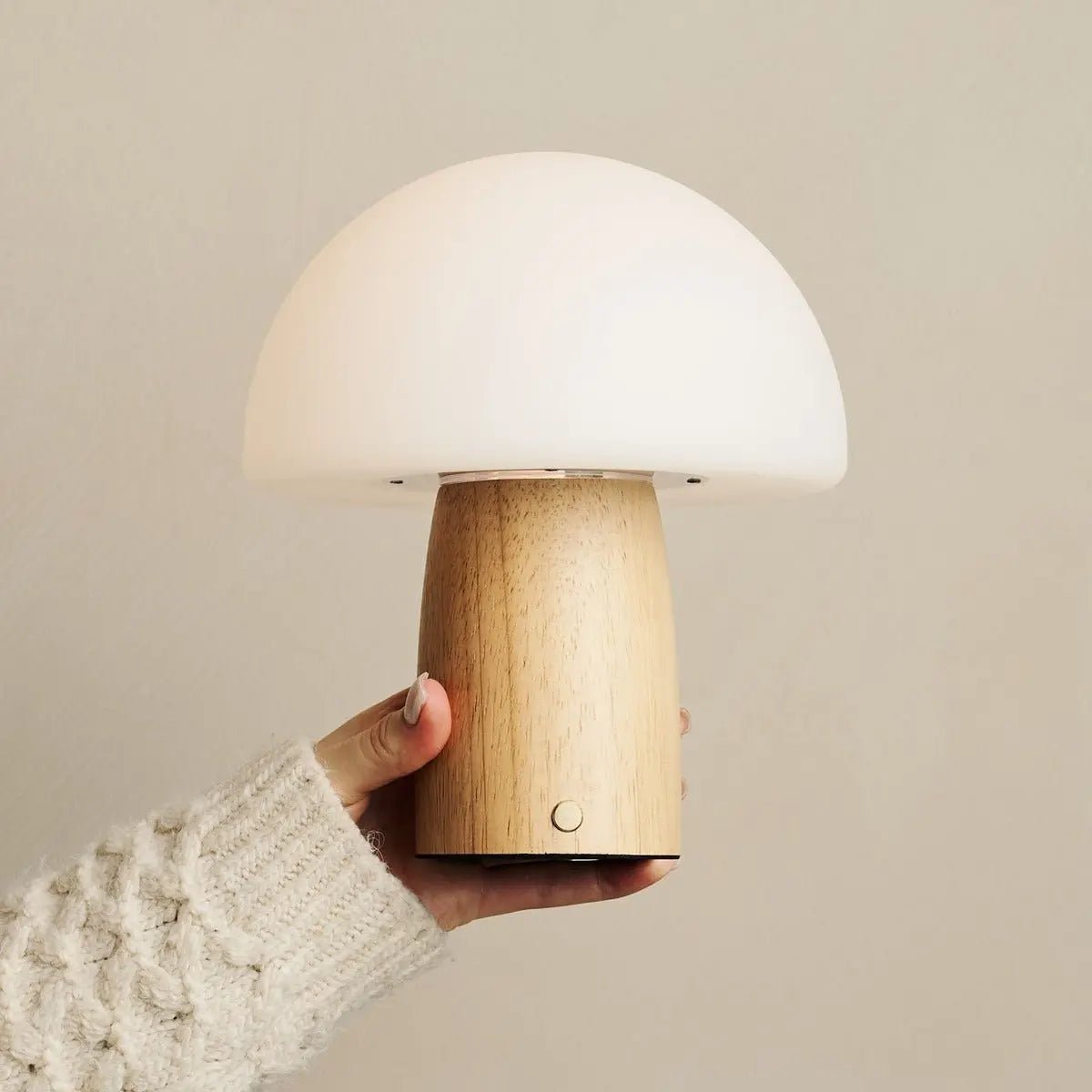 Mia cordless lamp side view showing rubberwood base and linen shade