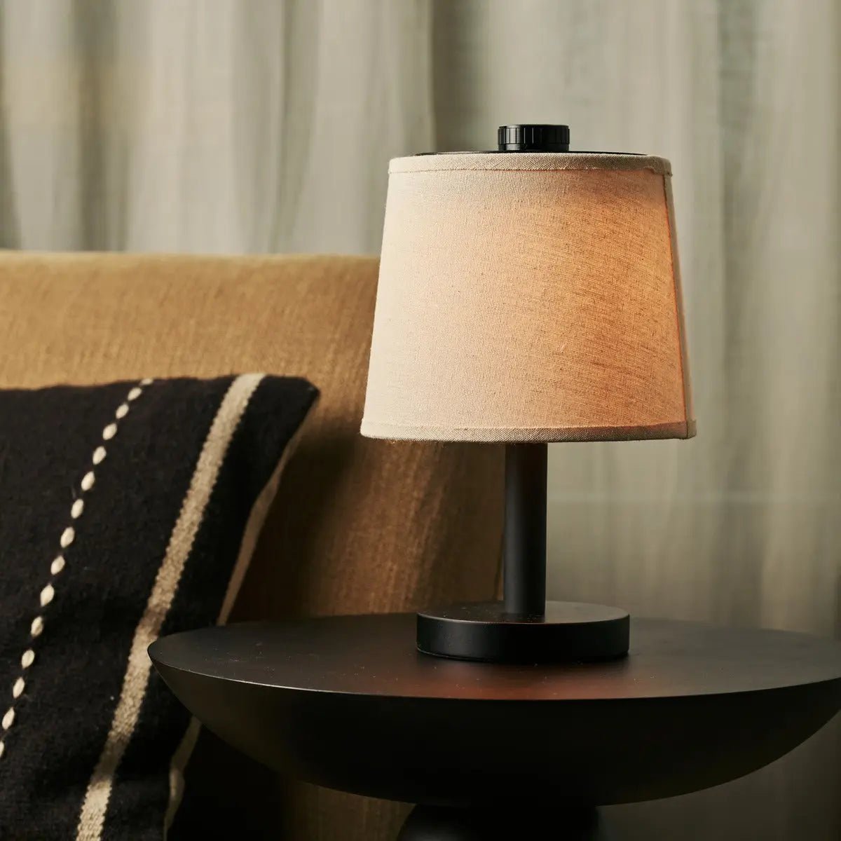 Rover cordless lamp side view showing black rubberwood base