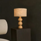 Oliver rubberwood linen lamp in modern interior