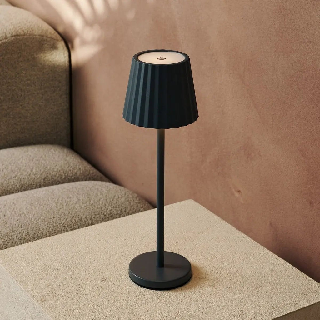 Maya metal lamp in living room console setting