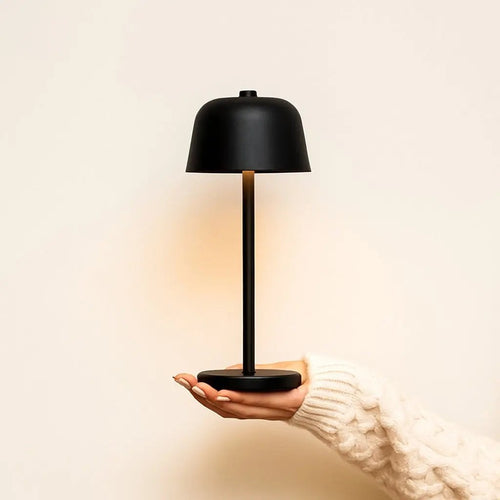 Anton metal lamp side view showing cylindrical matte black form