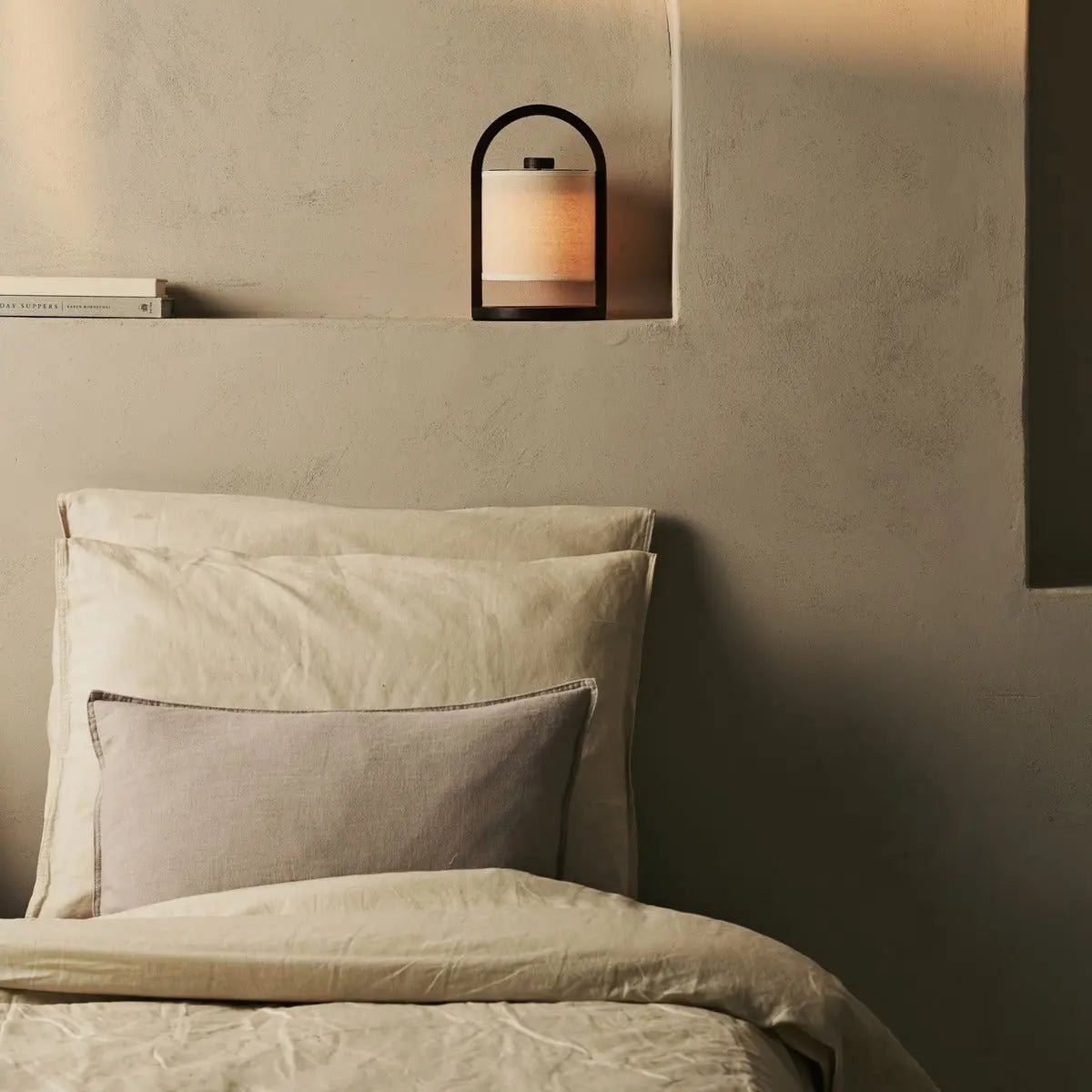 River cordless lamp on dining table in ambient light mode