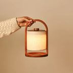 River rechargeable lamp in living room console