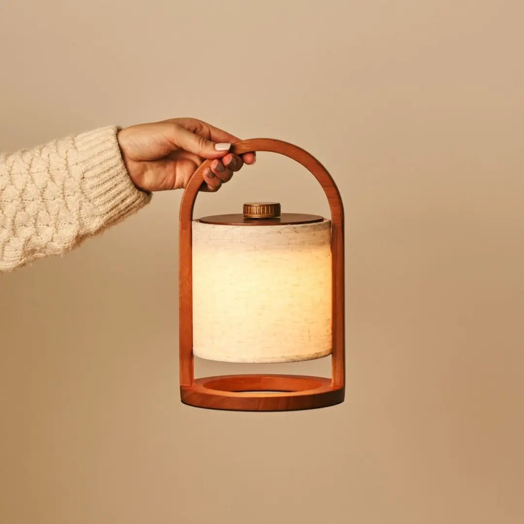 River rechargeable lamp in living room console