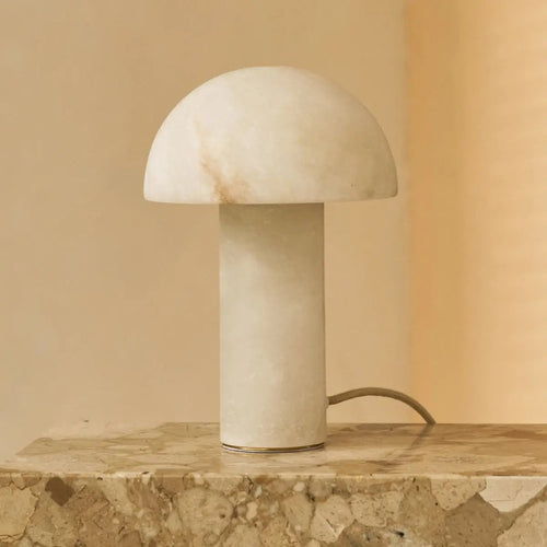 Alba solid alabaster lamp side view showing rounded silhouette