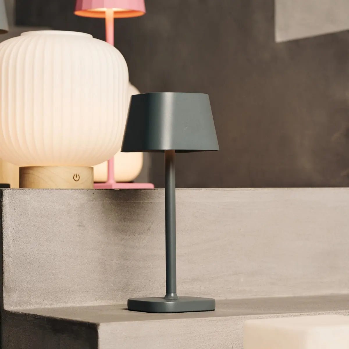 Sarphati rechargeable lamp in hotel lobby setting