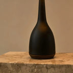 Jacob corded table lamp full view showing warm ambient light
